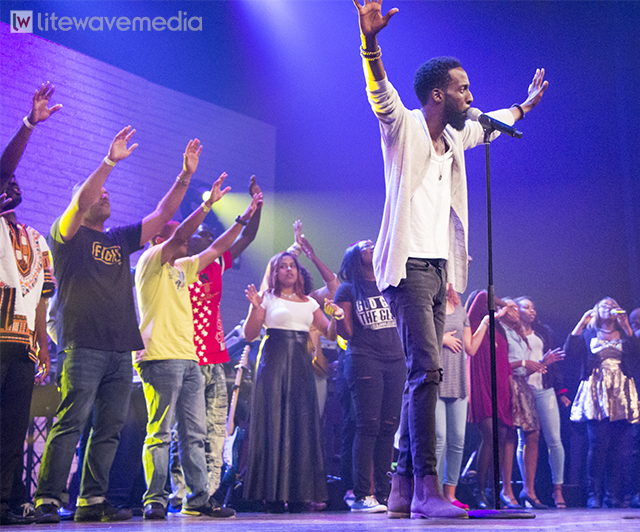 Grammy-nominated Tye Tribbett performs on stage with No Limits 
